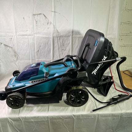 Makita DLM 330 RM Akku Rasenmaeher 18 V 33 cm 30 l 1x Akku 4 0 Ah Ladegeraet Reparaturgeraet 0 - toolbrothers